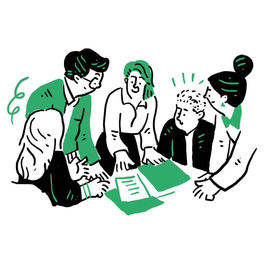 Personas trabajando juntas sobre documentos